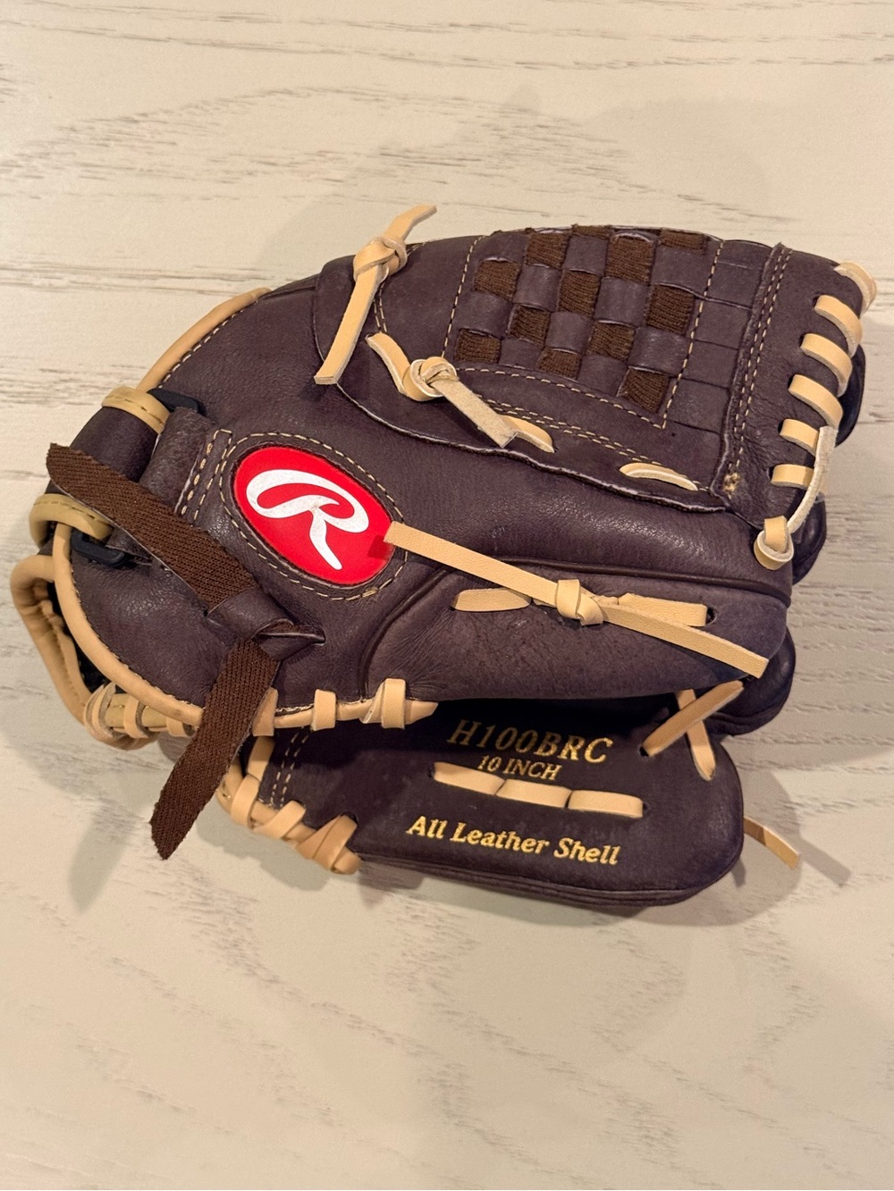 Rawlings Youth Baseball Glove bundle in Brown leather and Navy, Red, and White.